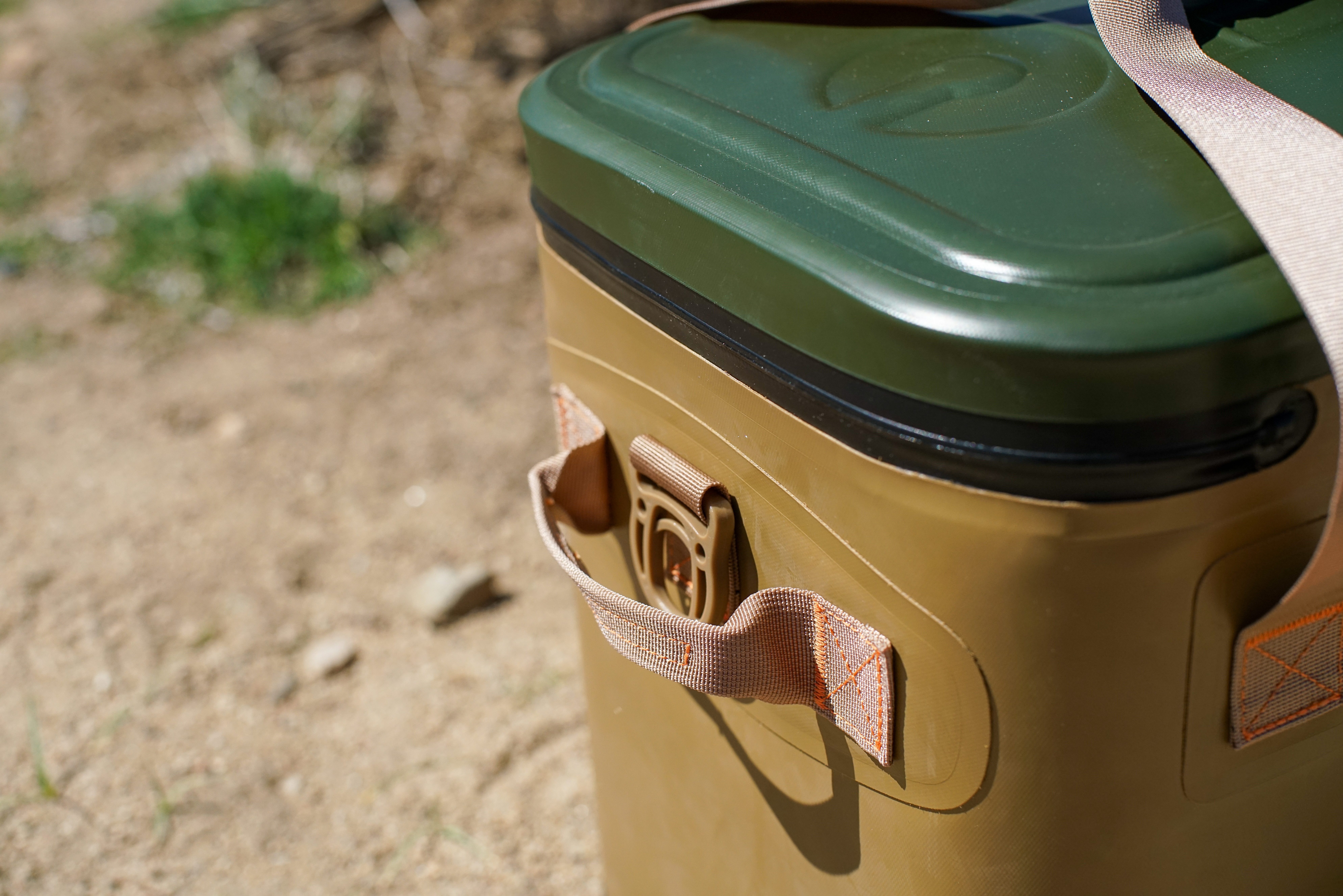 A close up of a side handle on the RTIC Soft Pack cooler.
