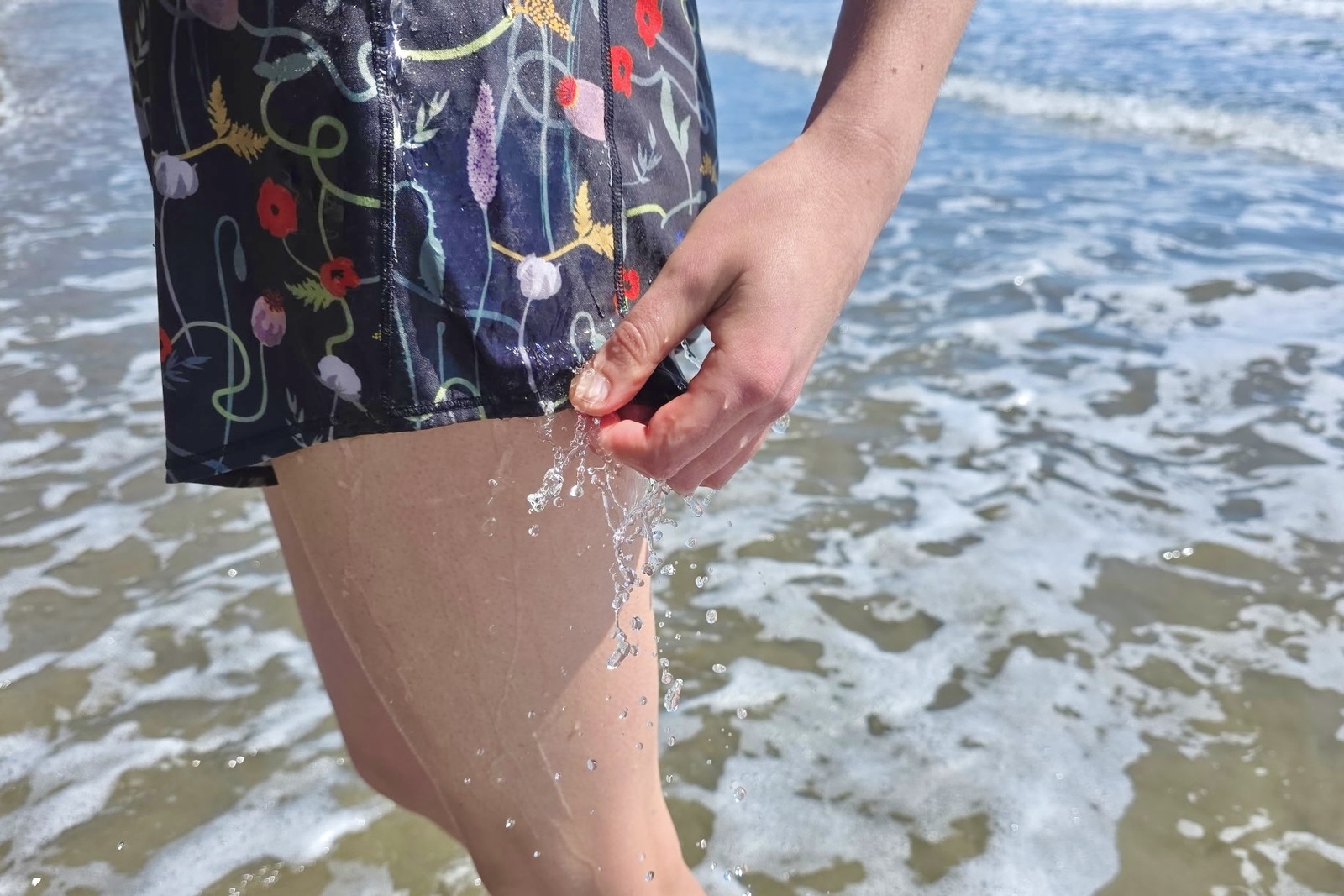Close up showing how water affects a pair of athletic shorts.
