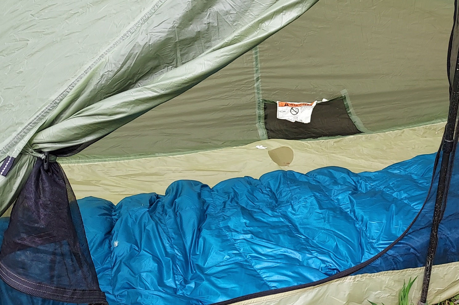 The Katabatic Flex 22 Quilt inside a tent