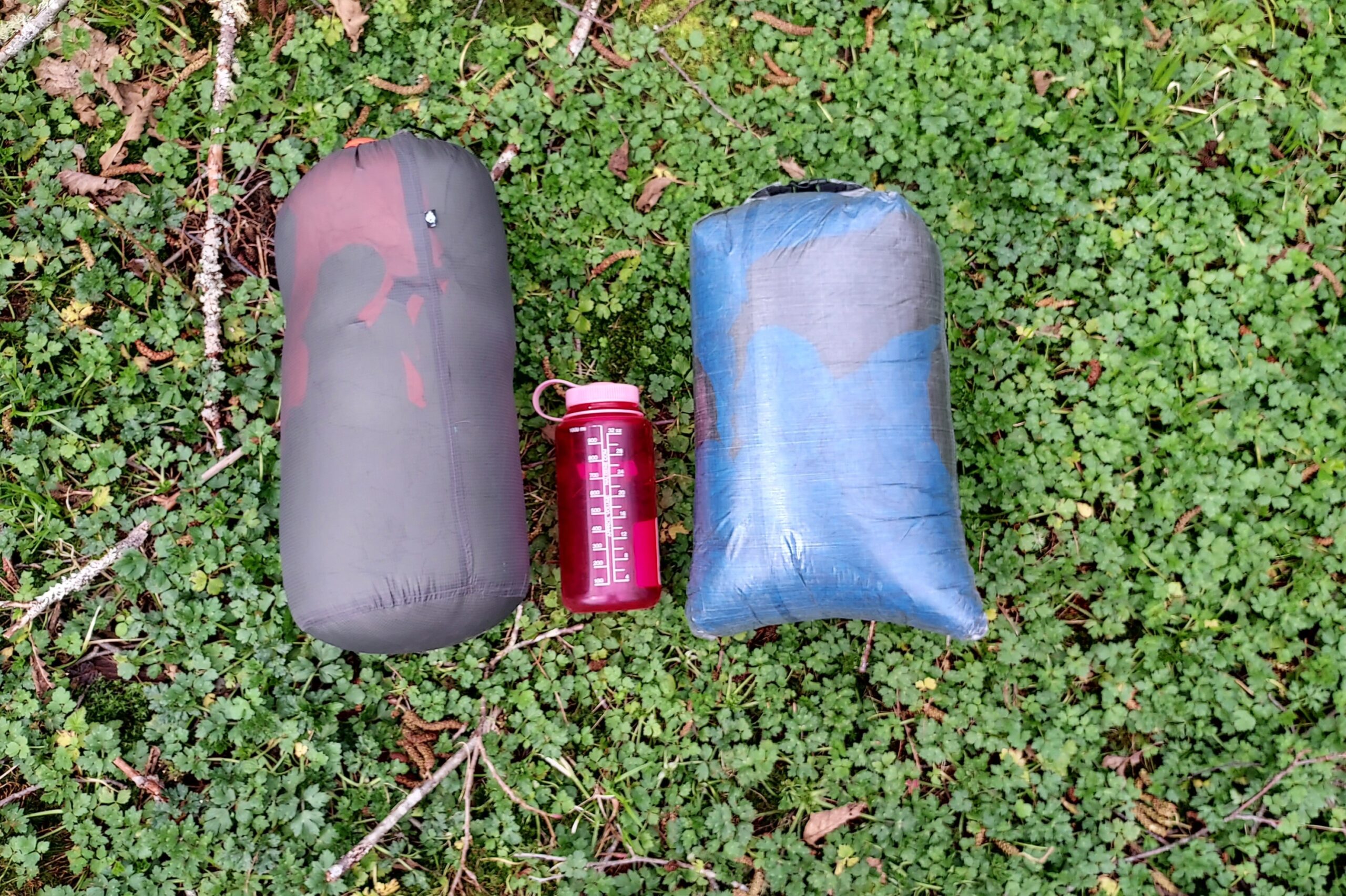 Enlightened Equipment Accomplice Quilt packed compared to the ZPacks Twin packed with a Nalgene for reference