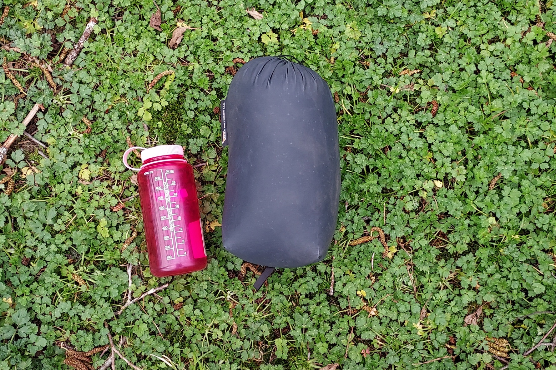 UGQ Bandit 20 Quilt packed with a Nalgene for scale