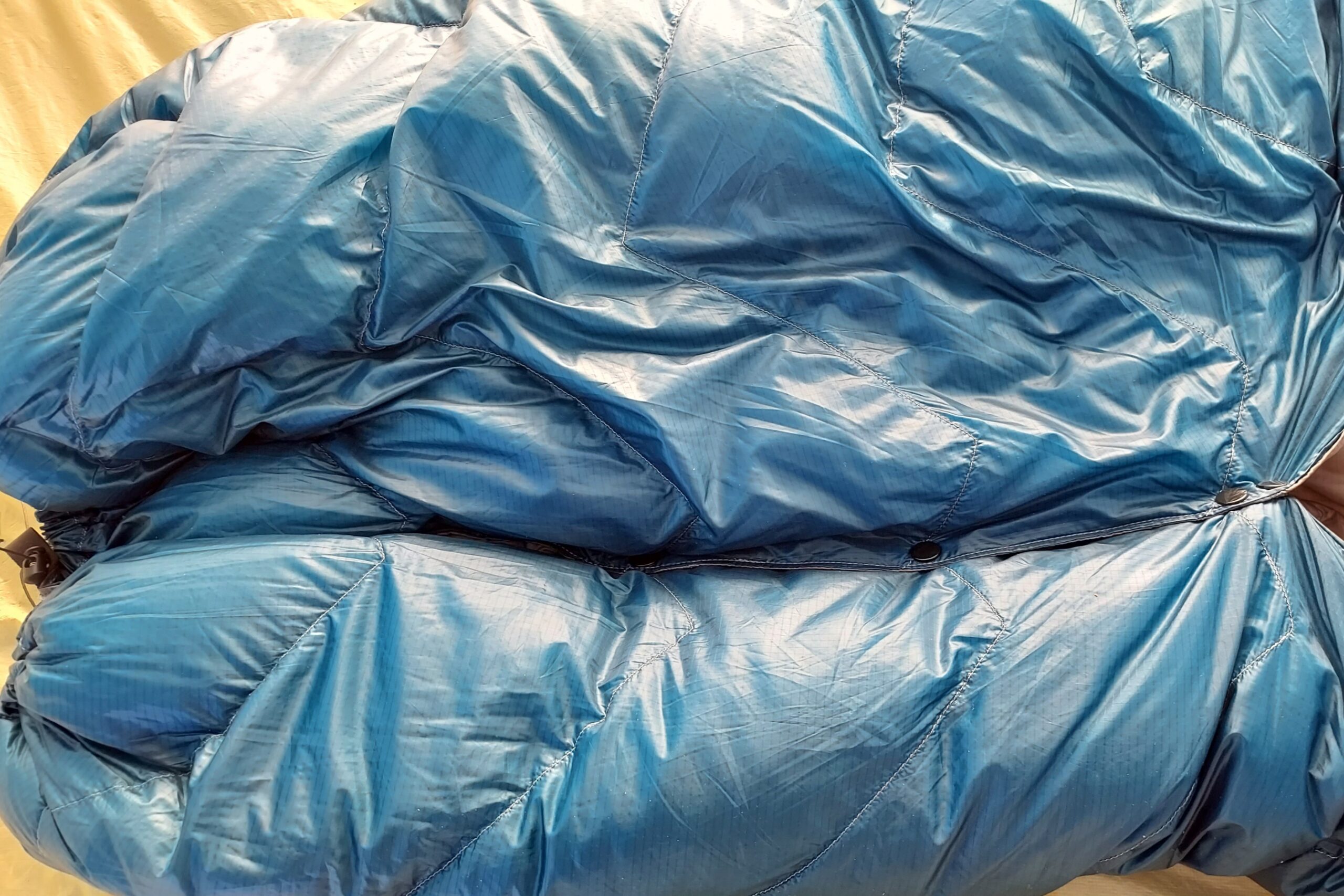Close up of the snap closures on the Loco Libre Operator Series Ghost Pepper 20 Quilt