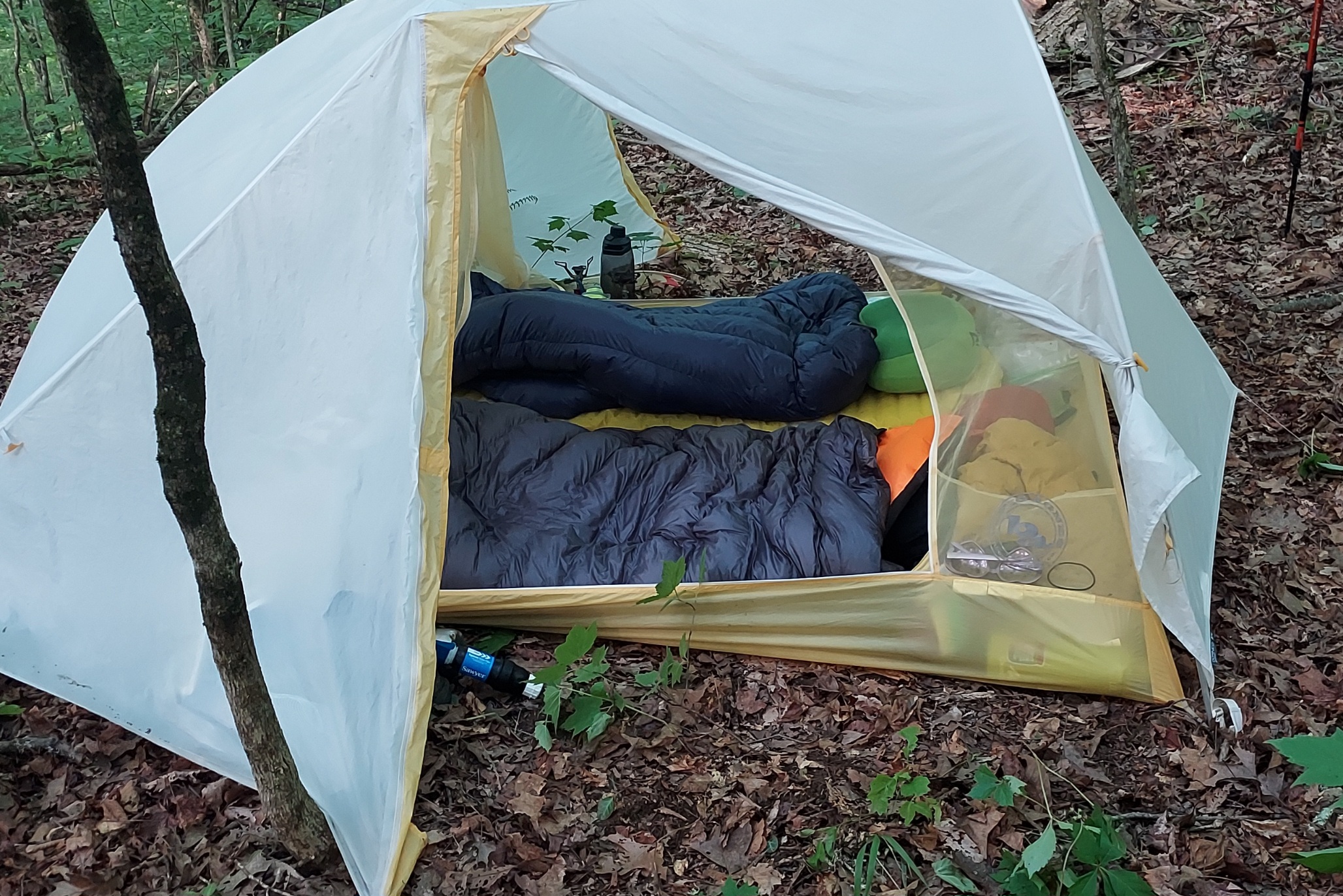 The Western Mountaineering AstraLite Quilt in a tent