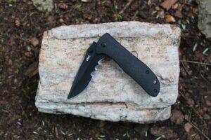 The CRKT Drifter Pocket Knife closed on a rock