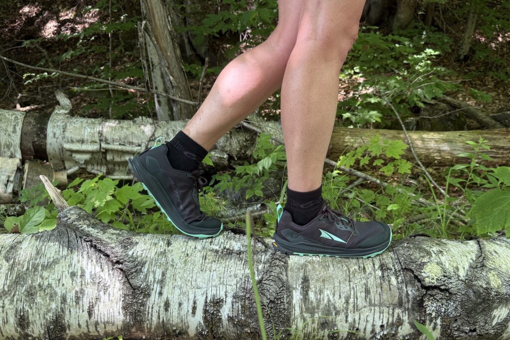 close up of the Altra Lone Peak 9+on a log