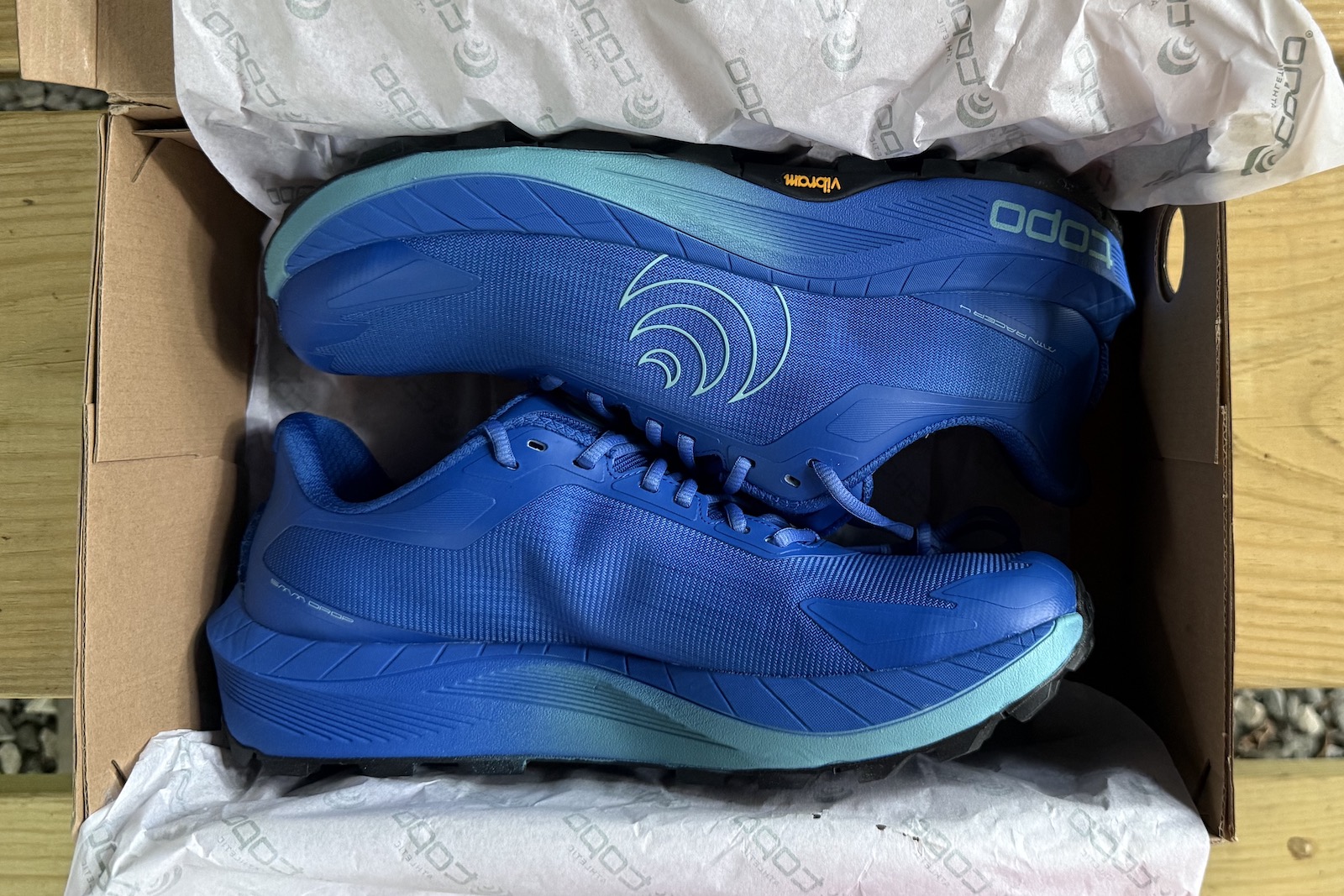 close up of the Topo Athletic MTN Racer 4 in the box