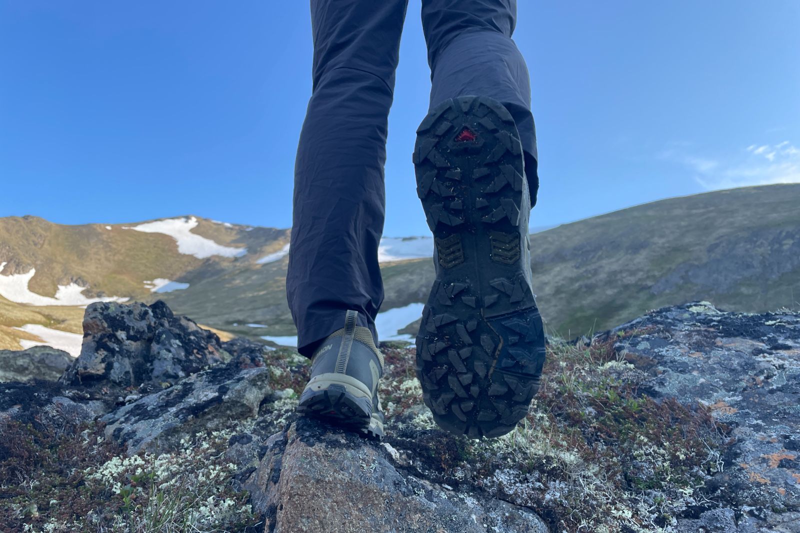 A closeup of the tread of a pair of hiking shoes.