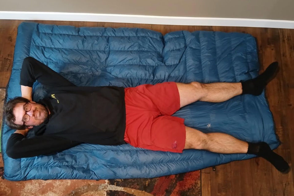 Hammock Gear Burrow 20 Quilt with a person for scale