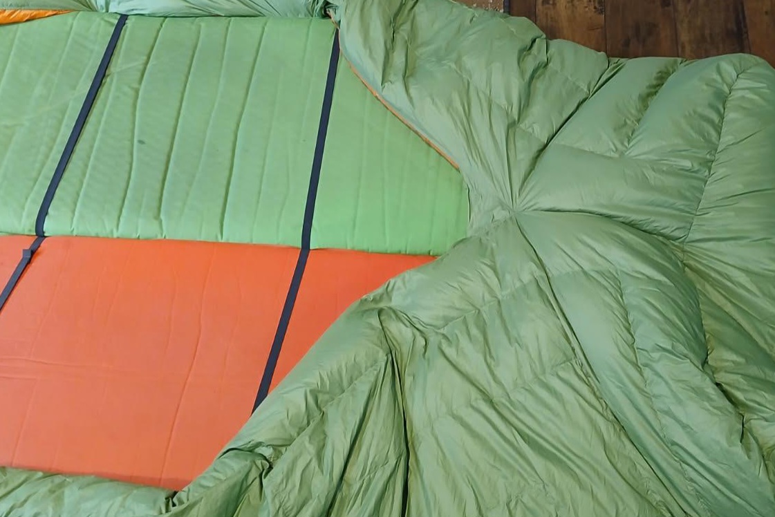 Enlightened Equipment Accomplice Quilt with pads and straps