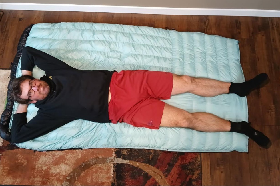 UGQ Bandit 20 Quilt with a person for scale