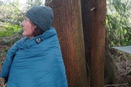 Hammock Gear Burrow 20 Quilt wrapped around a person