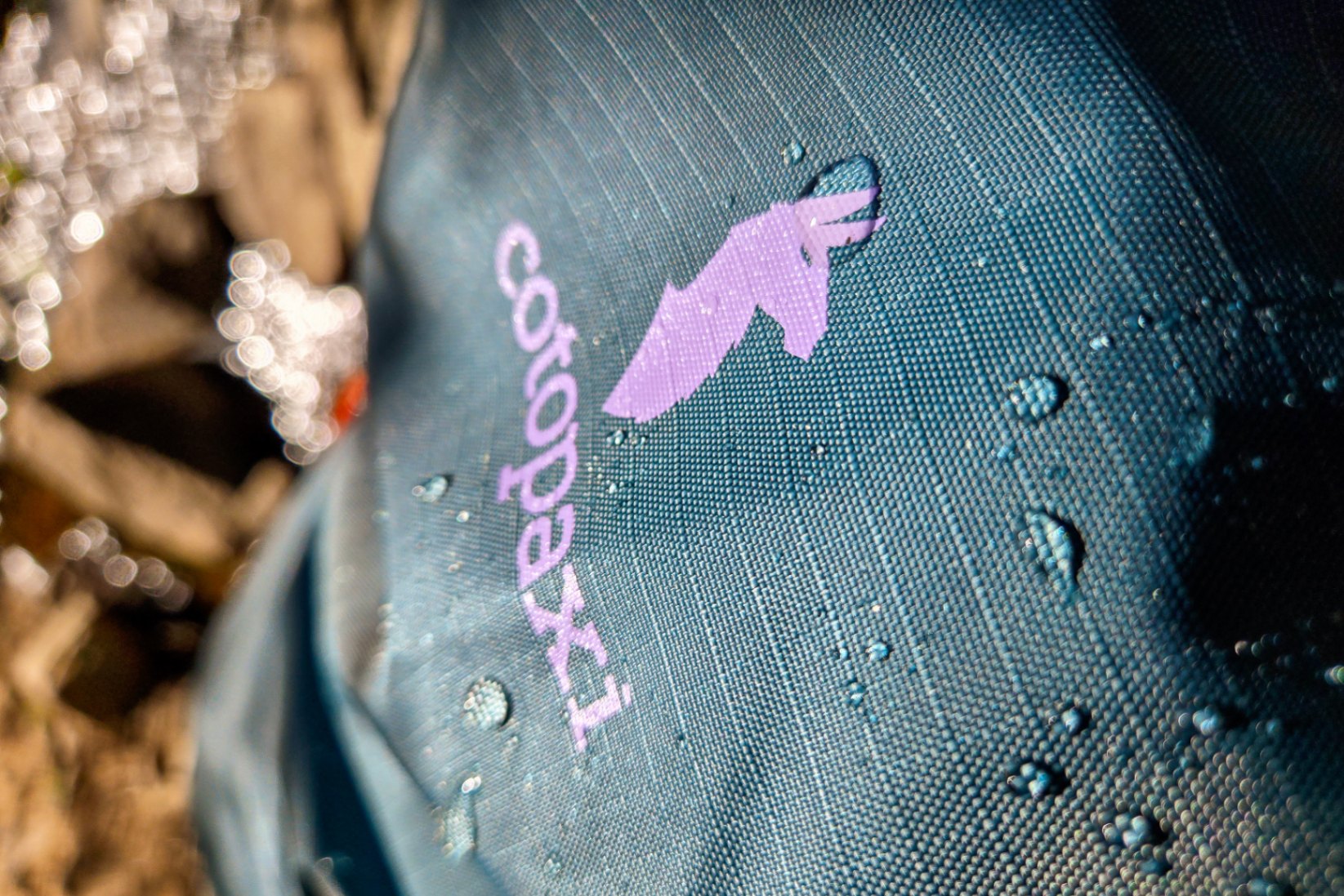 Water beads up on the Cotopaxi nylon fabric.