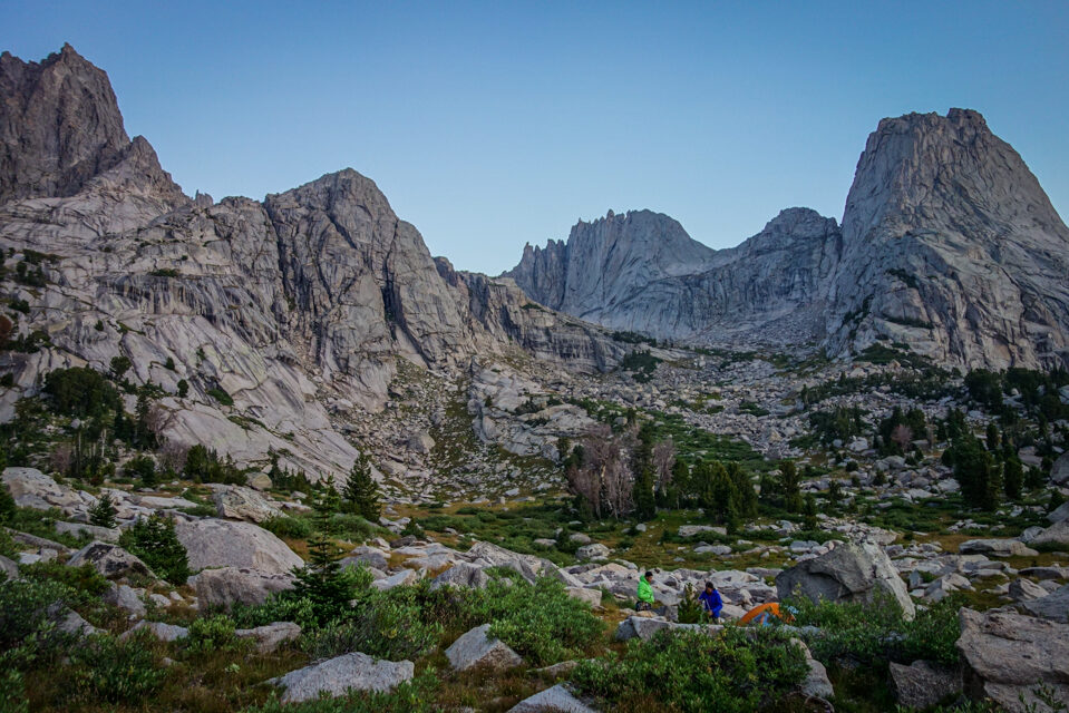 backpackers setting up camp in the rocks of the wind river range 