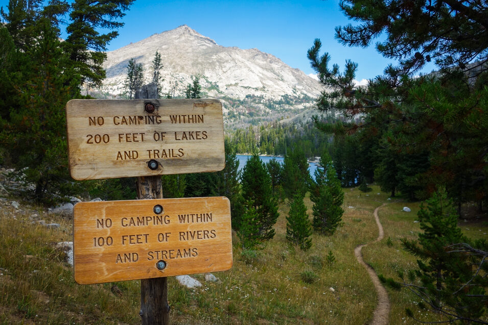signs saying to camp away from trails and rivers in the wind river range