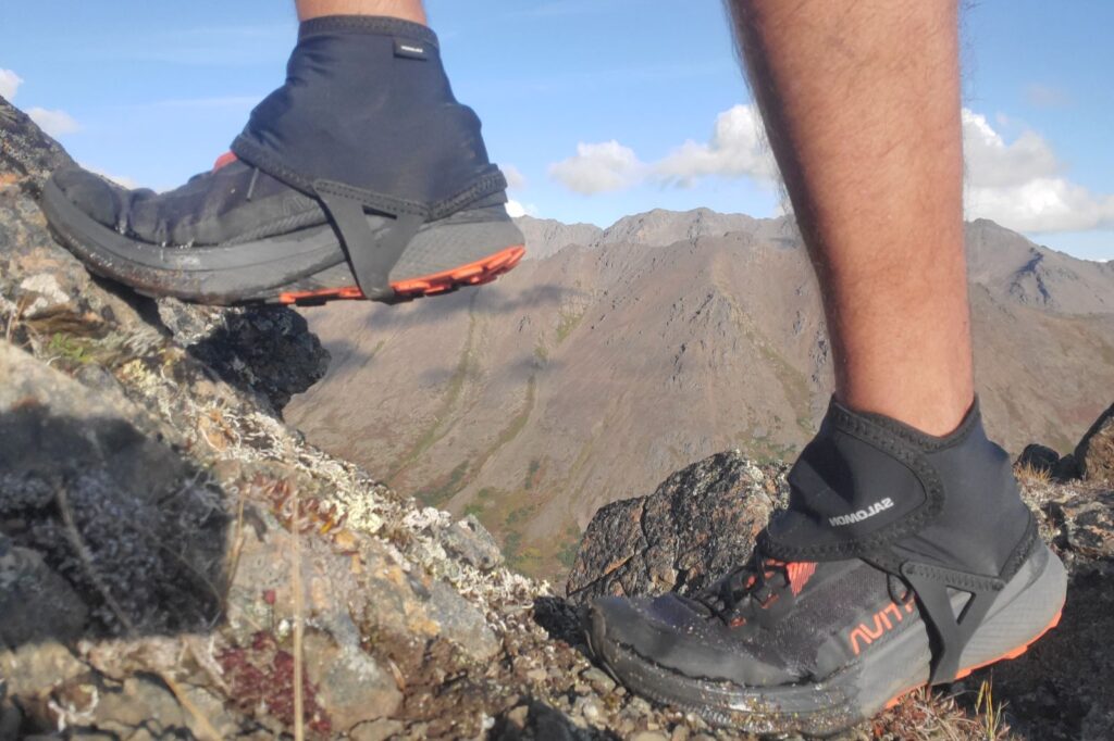 A pair of gaiters worn hiking up a mountain.