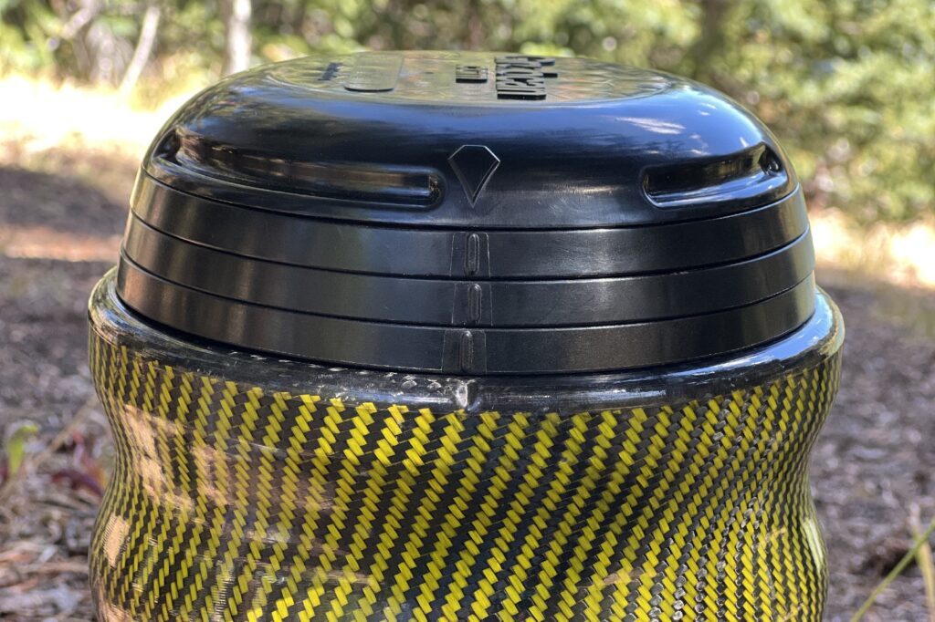 a close up of a bear canister with all three locking discs aligned