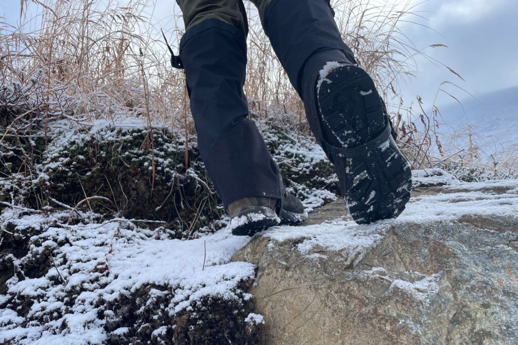 A closeup of the instep of hiking gaiters