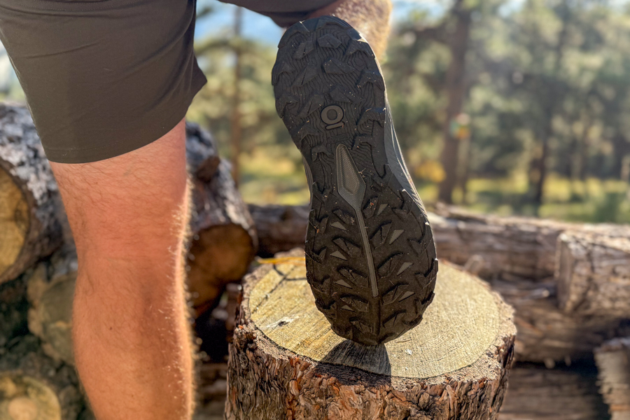 View of the outsole tread on the Oboz Katabatic LT Mid boot, lifted to show the aggressive lugs designed for traction on rugged terrain.