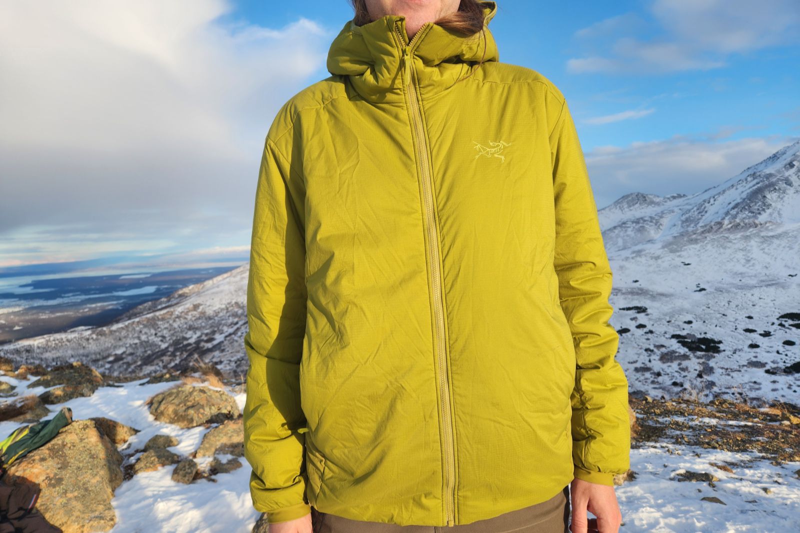 A closeup of a green insulated jacket.