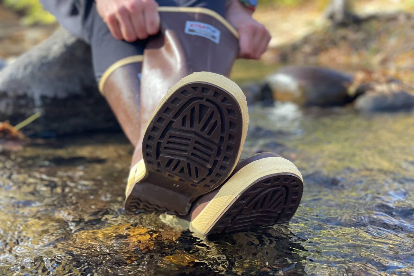 Showing off the tread pattern in a stream with the XTRATUF 15" Legacy Boots.