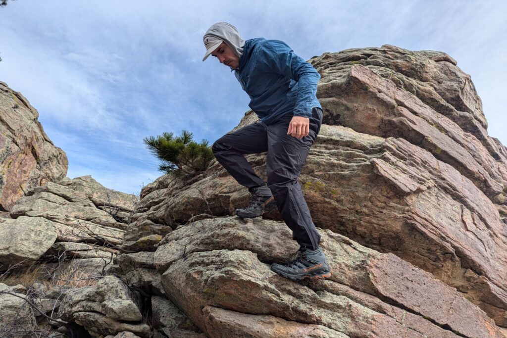 Hiking down some rocks in the Salomon Bonatti pants.