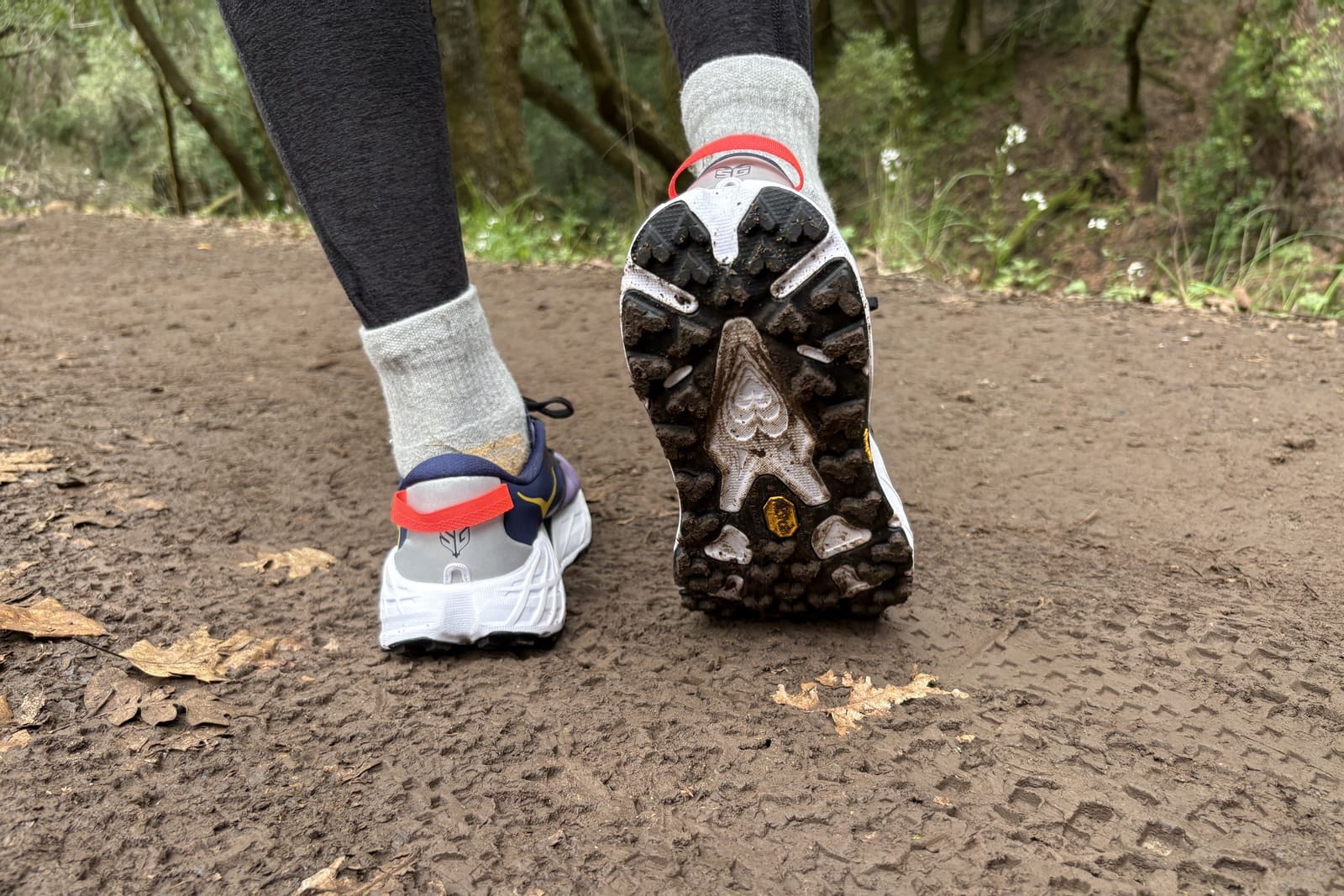 Closeup of the tread on the bottom of a pair of shoes.