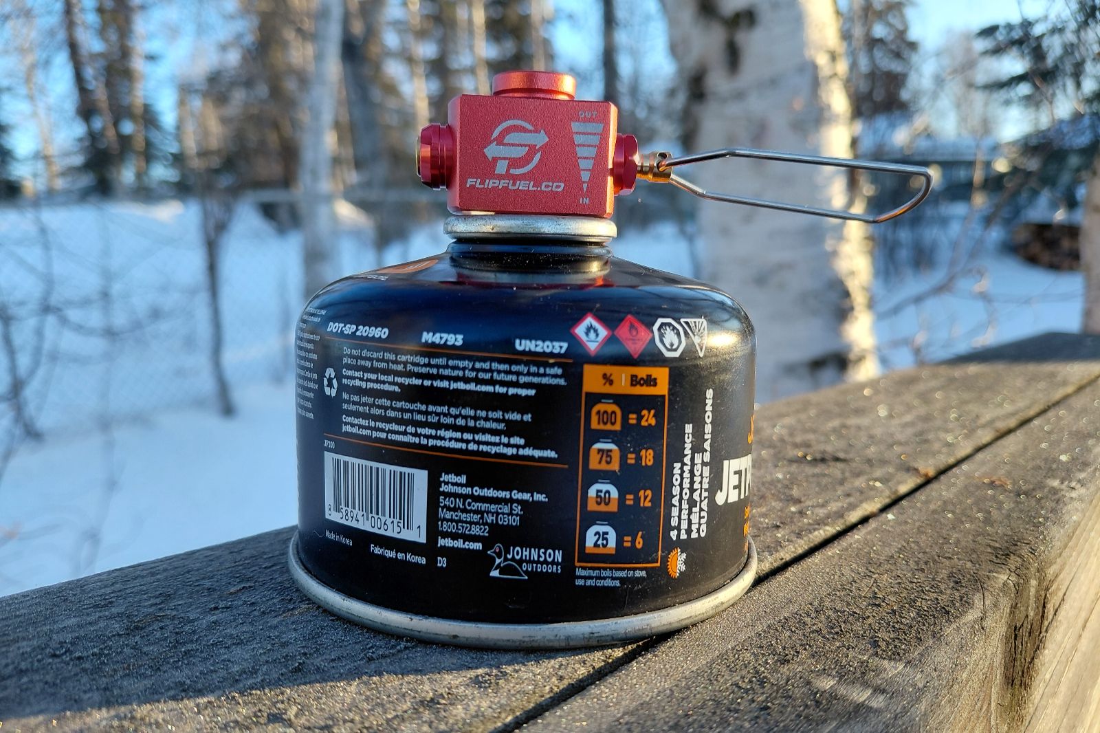 A close-up of the FlipFuel attached to a fuel canister.