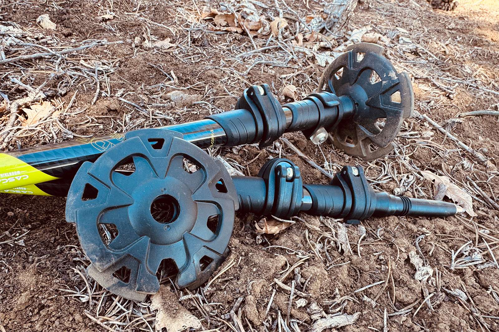 Close up of the winter baskets on the Cascade poles. They are sitting on the ground.