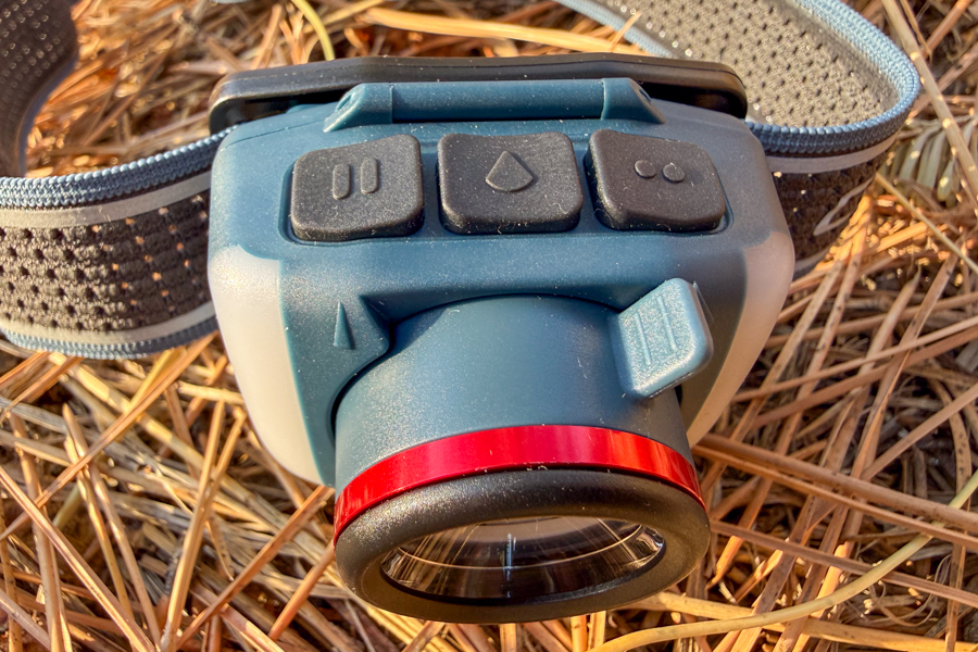 Top view of the Coast FL95R showing three control buttons and the GLIDE FOCUS slider/lever above the lens.