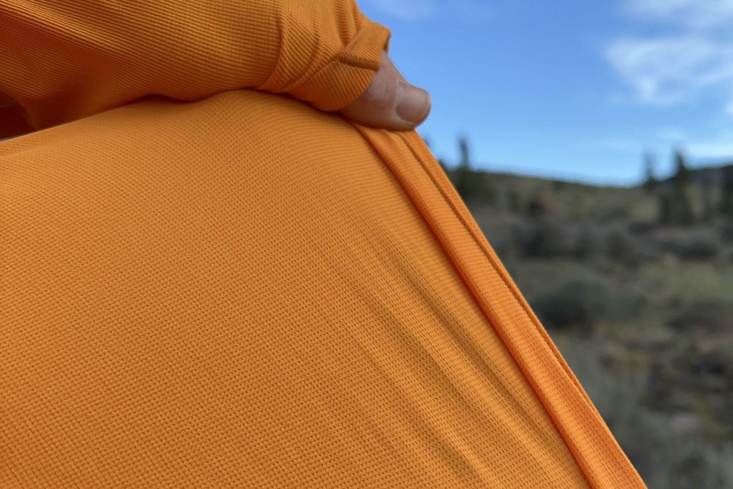 A close up of an orange fabric.