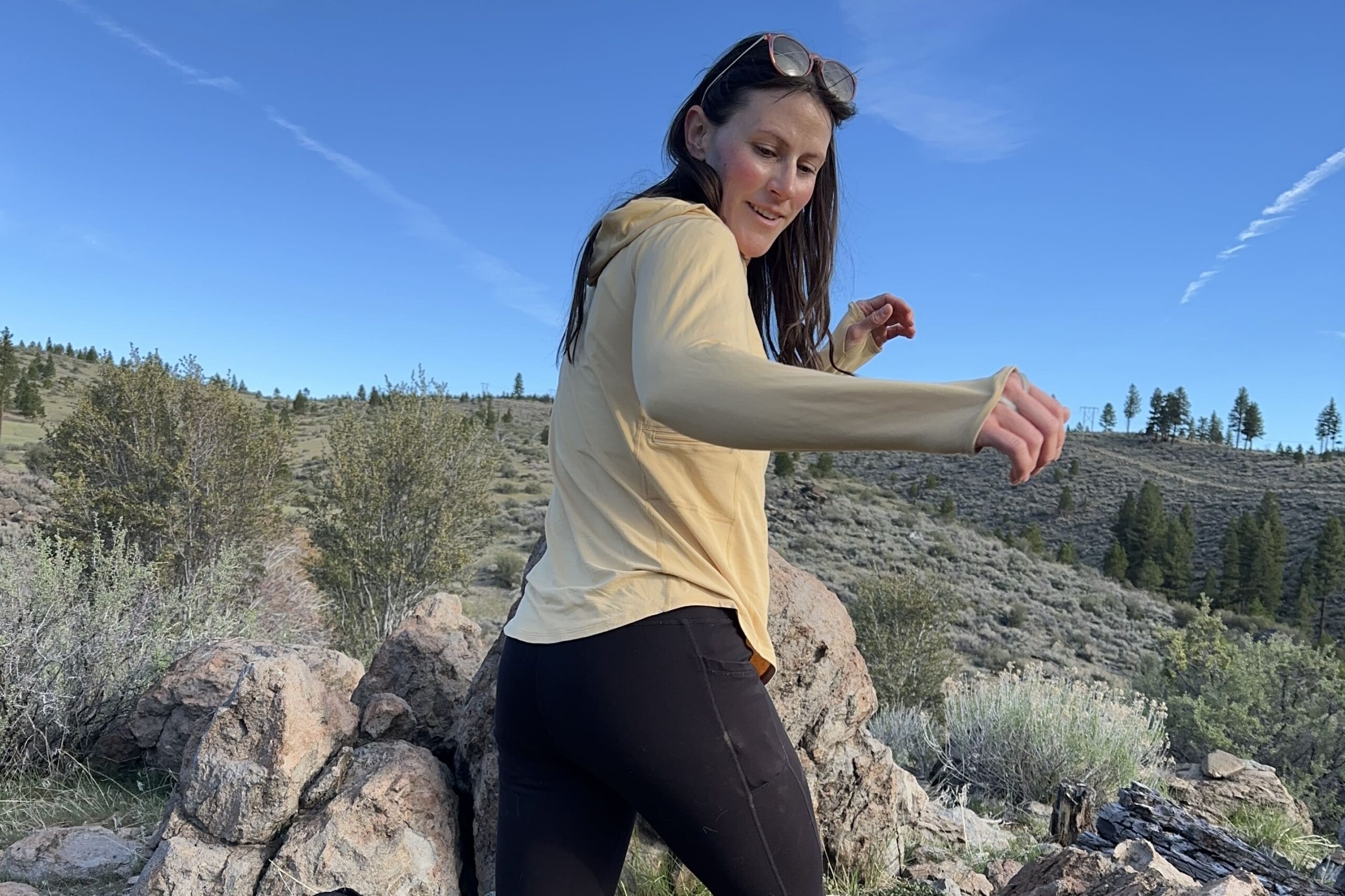 A woman hiking in the high desert.