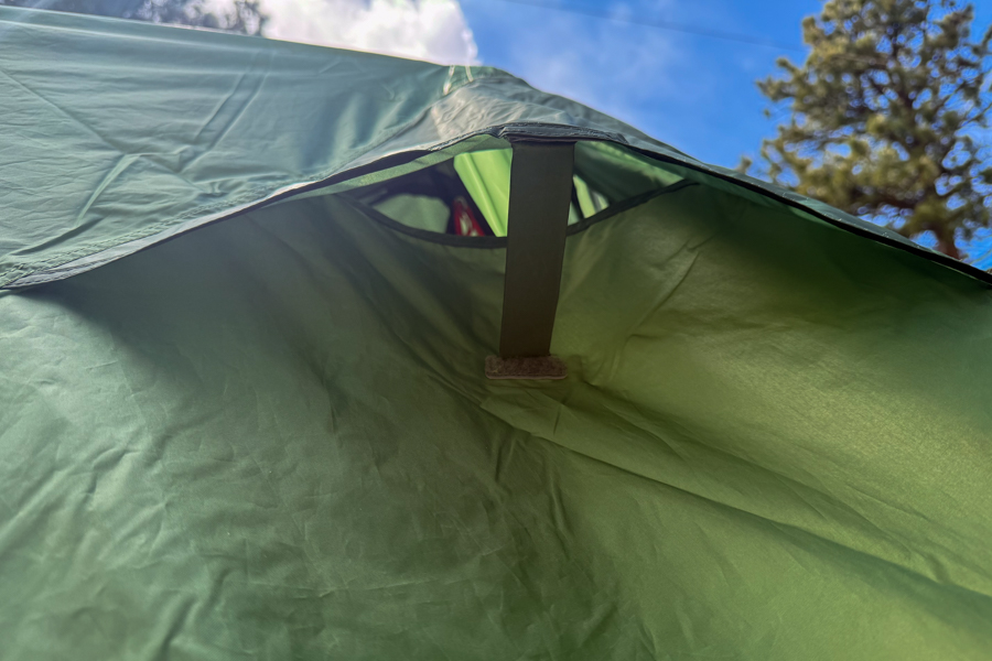 Close-up of one of the Kelty Wireless 6 tent's kickstand vents propped open on the rainfly.