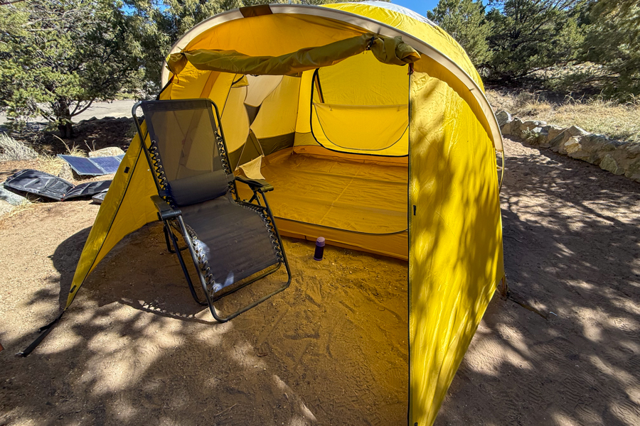The Base Camp 6 tent body pitched without the fly, showing the tall front door and broad dome shape.