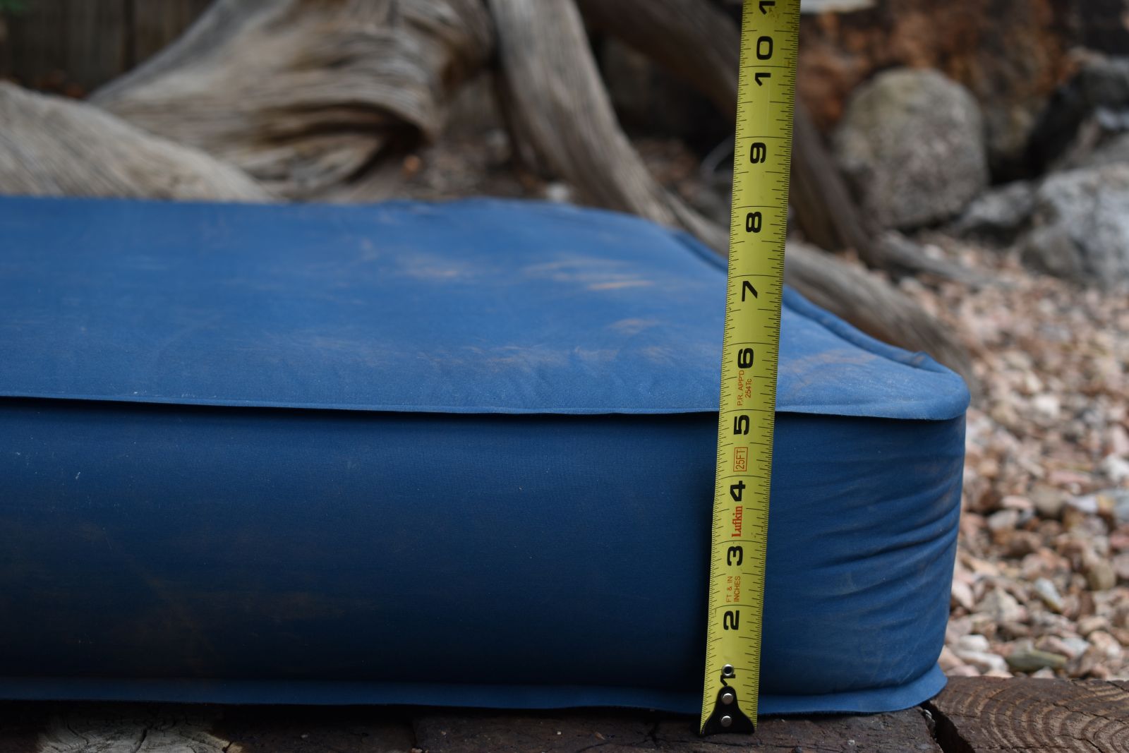 A tape measure shows the Captain Comfort Deluxe Camp is legitimately 5 inches thick
