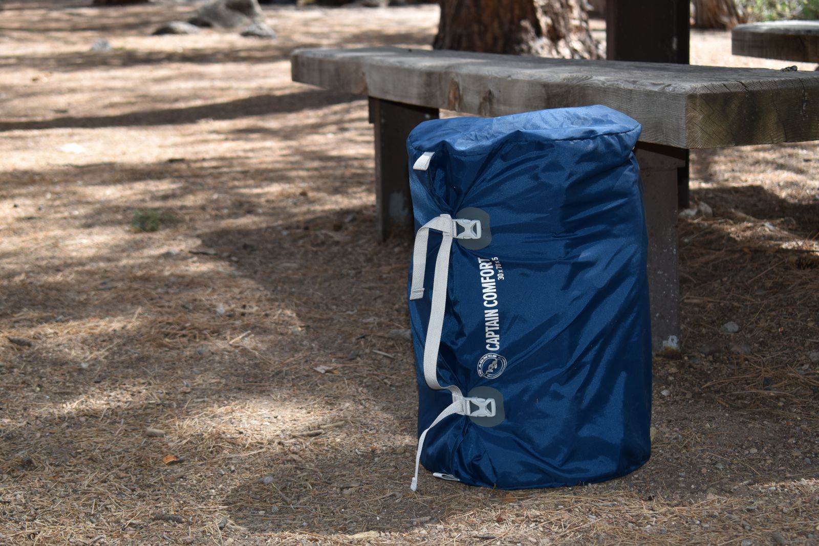 The Captain Comfort packed up next to a picnic table in a New Mexico campground