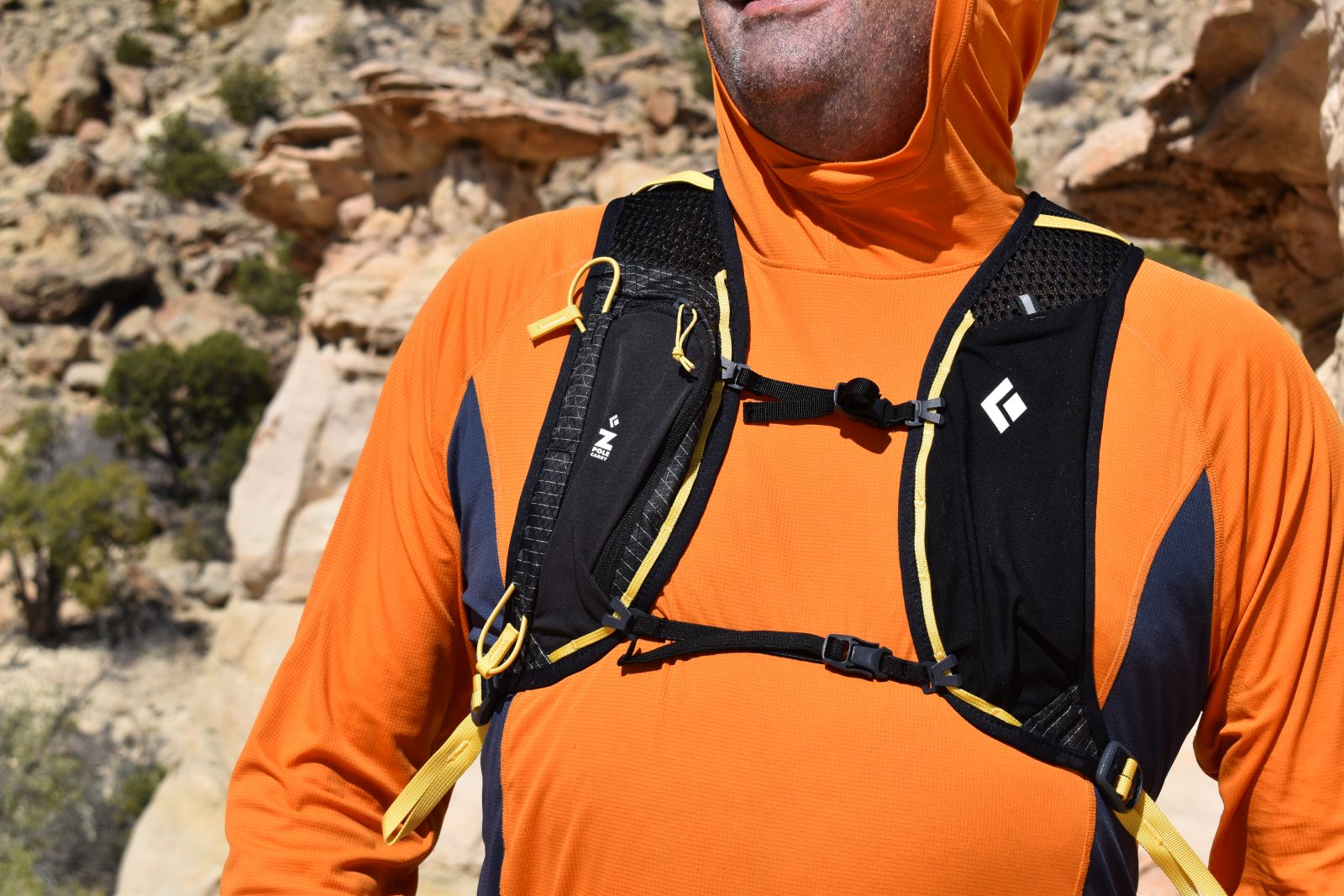 Close up of the sternum straps and ergonomic shoulder straps of the Pursuit 15 daypack