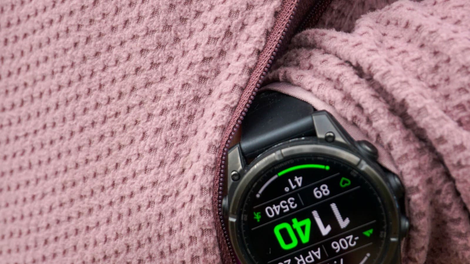 Close-up of hand inside a zippered pocket