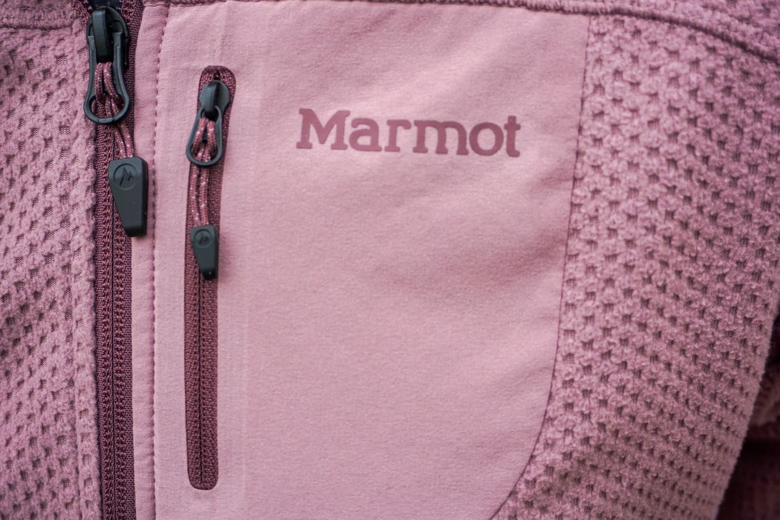 Close-up of zippered chest pocket on a jacket