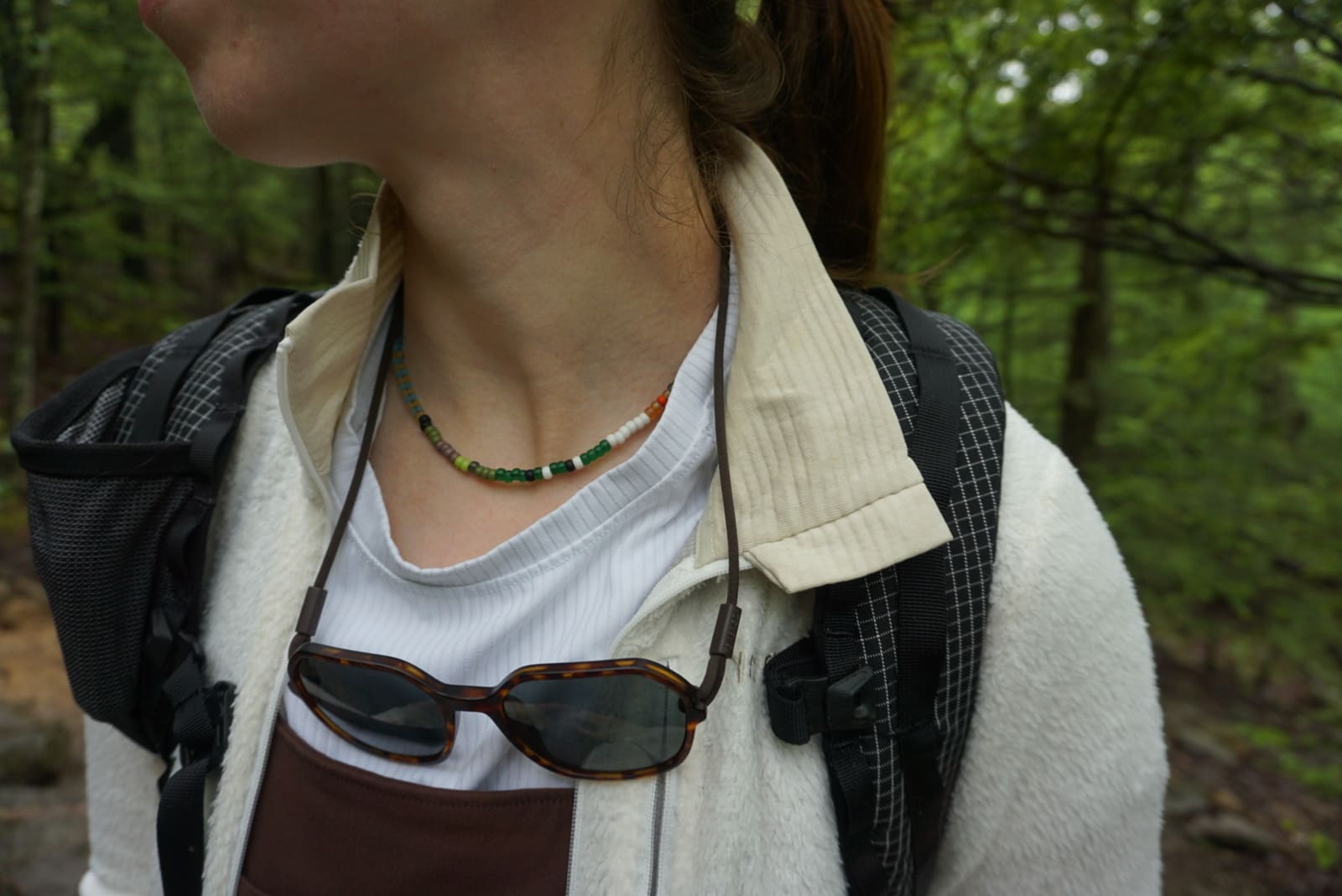 Woman shows collar of jacket