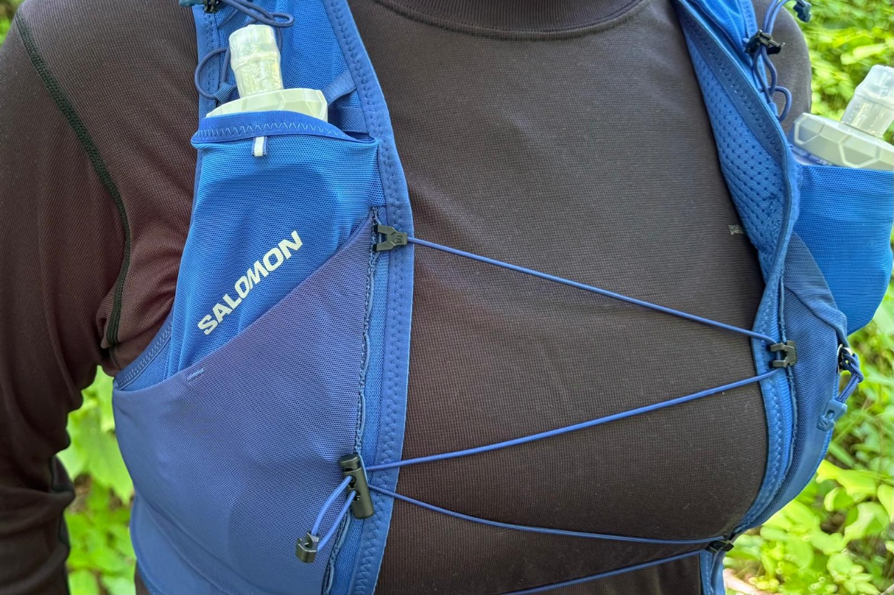 Close-up image of the sternum closure on a blue running vest.