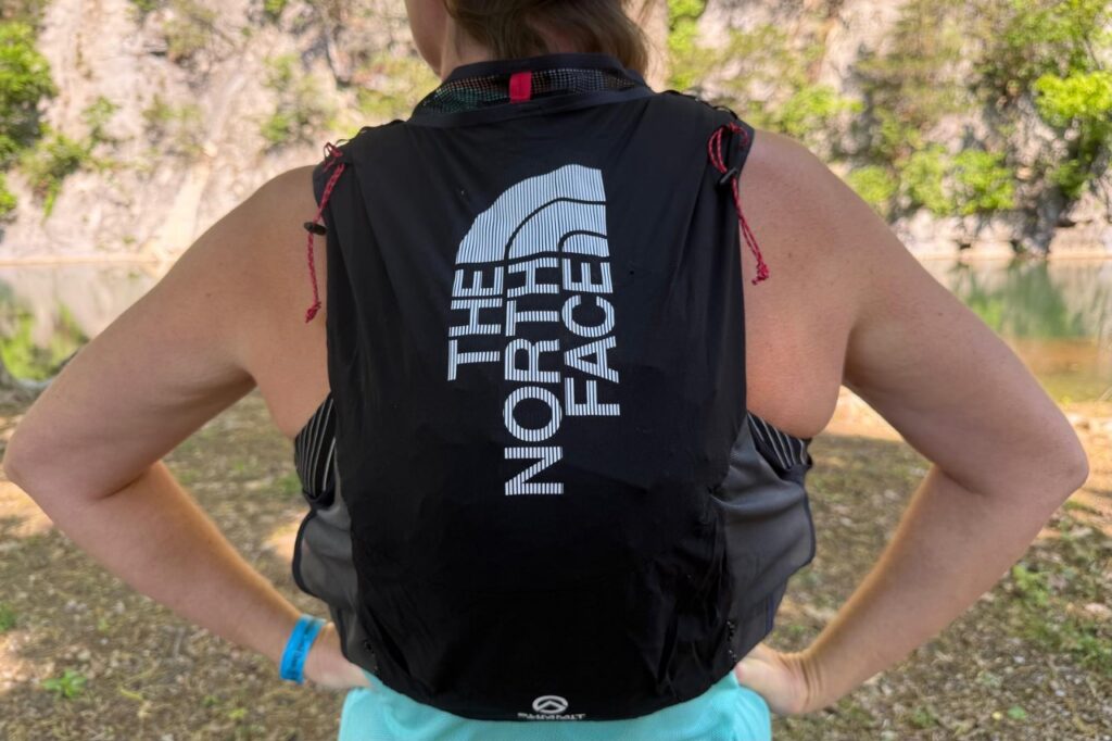 Close-up of the back of a black running vest.