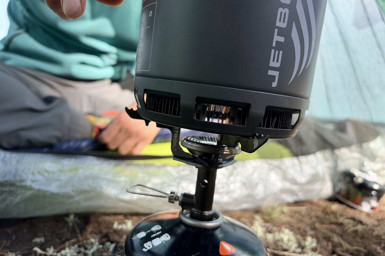 Close-up image of a cook pot on a backpacking stove.
