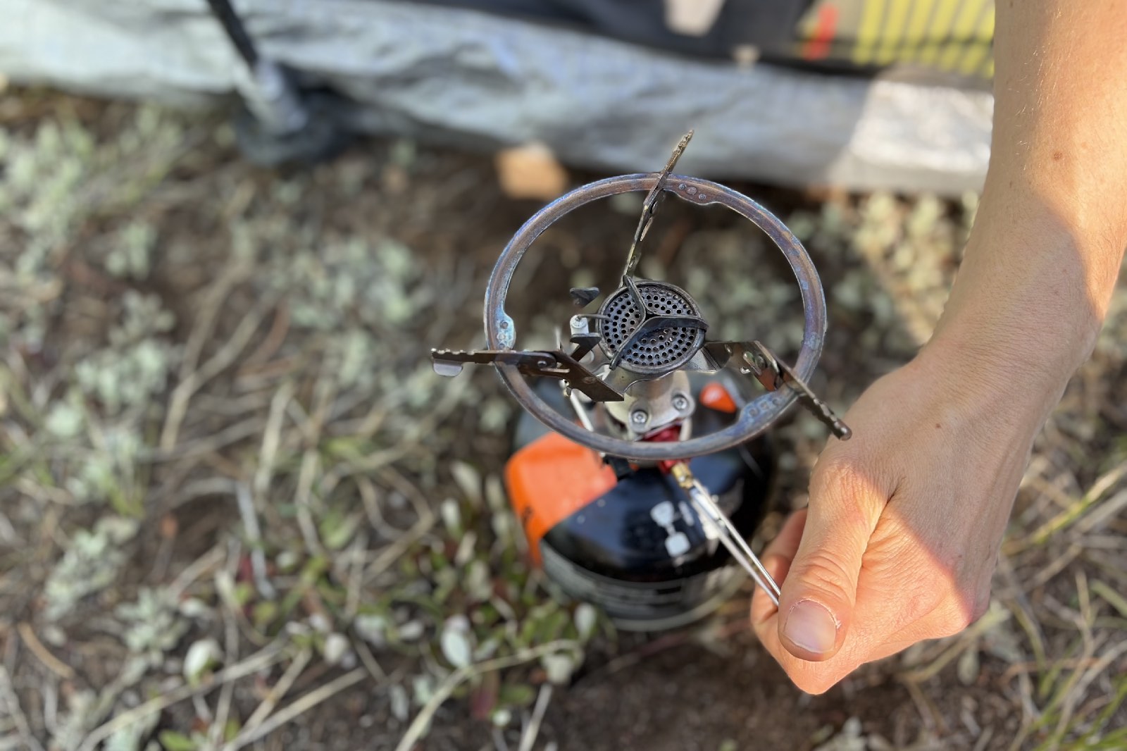 A top-down view of a backpacking stove.