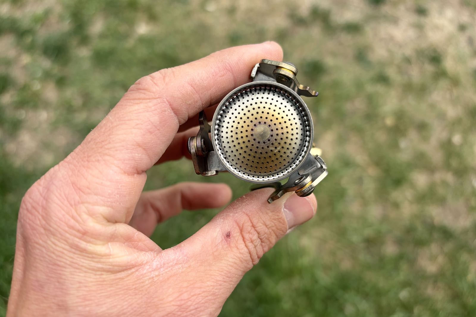Close-up image of the burner of a backpacking stove.