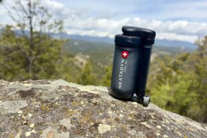 A water filter on a rock.