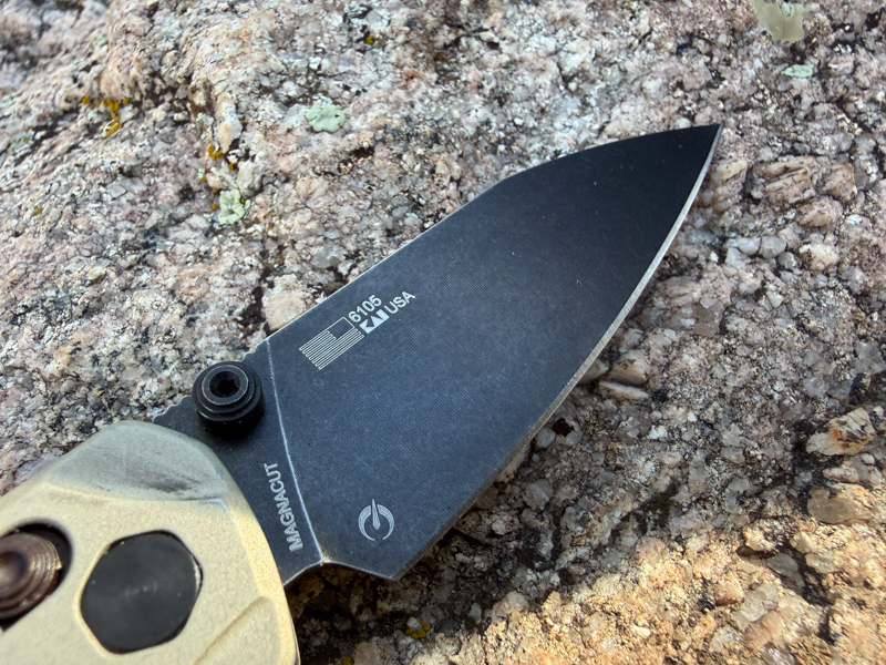 Close-up of the Kershaw Bel Air MagnaCut blade showing the blade finish and USA markings on the flat of the blade.