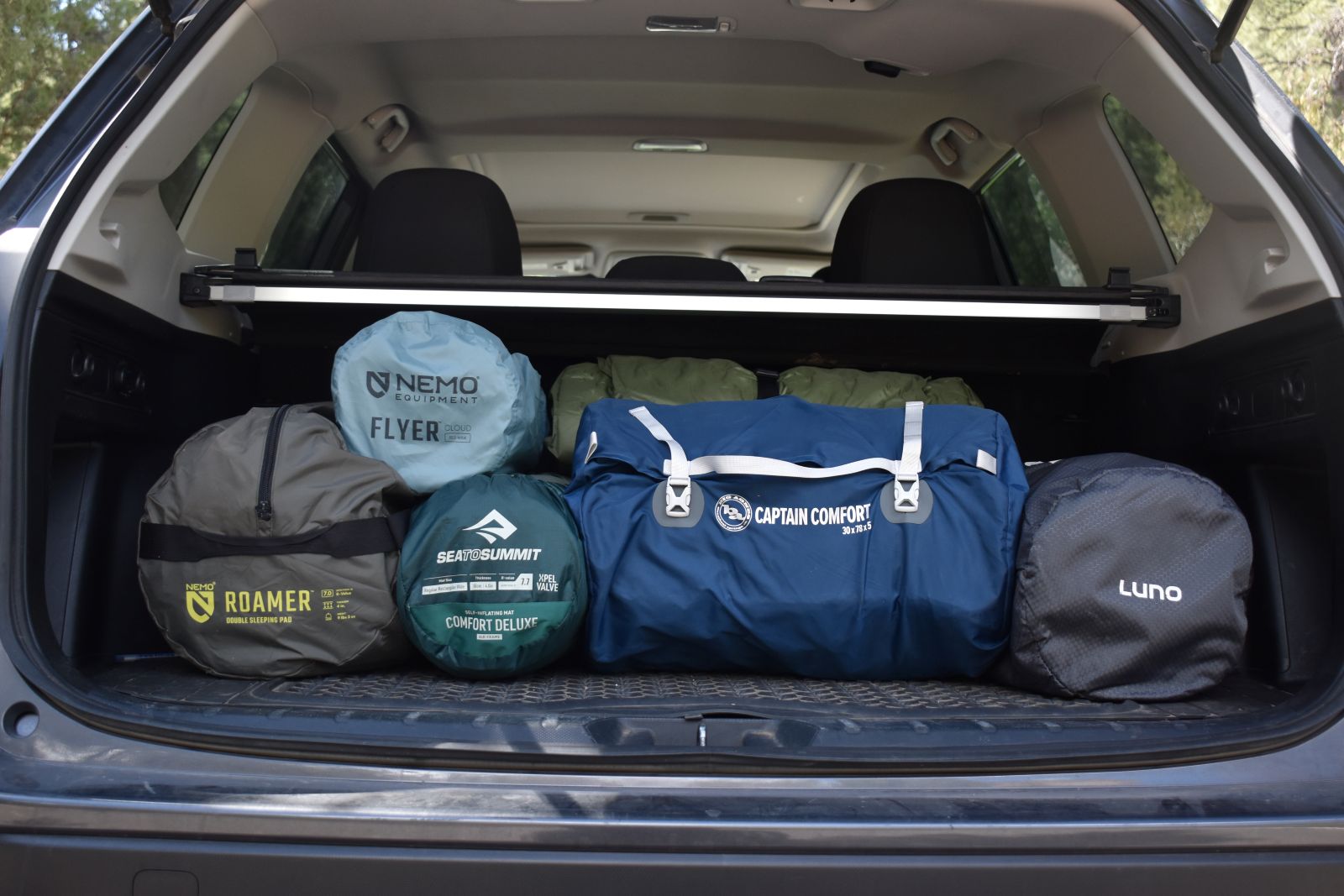 The back of our tester's Subura filled with new and updated camping mattresses for 2026