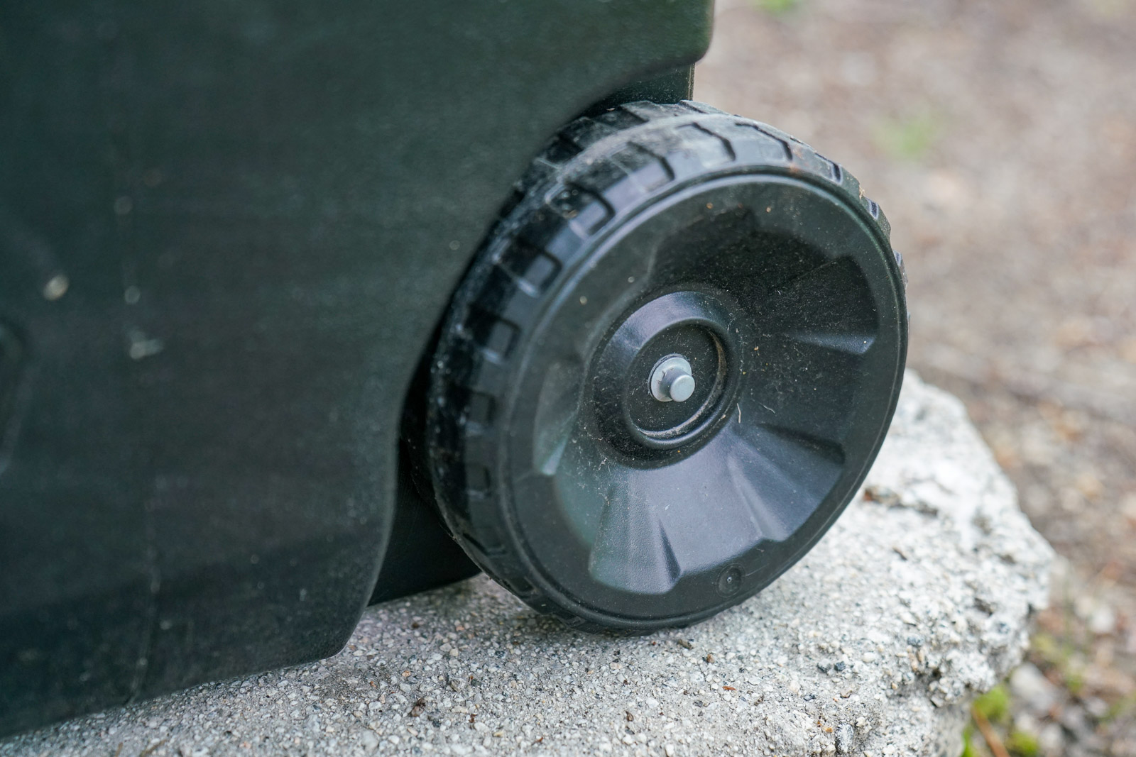 A close up of a cooler wheel.