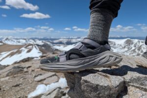 Showing off the side profile of the Hoka Infini Hike TC's on Mount Lincoln.