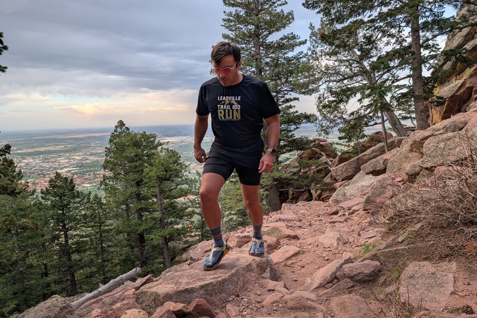 Hiking up a rocky trail in the Lems Switchback Knit sandals.